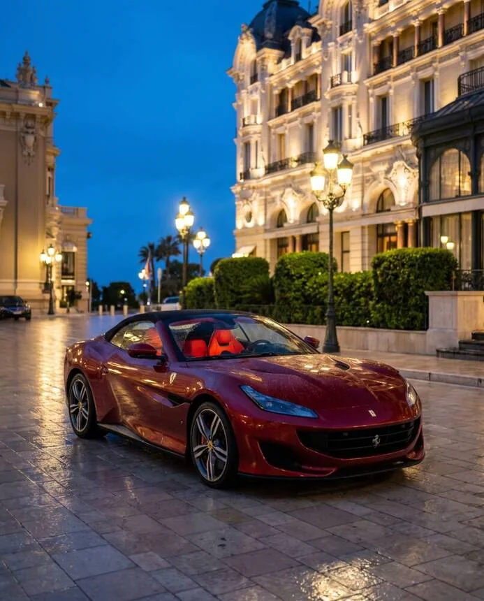 Red convertible at Monte Carlo in the evening, wide crop